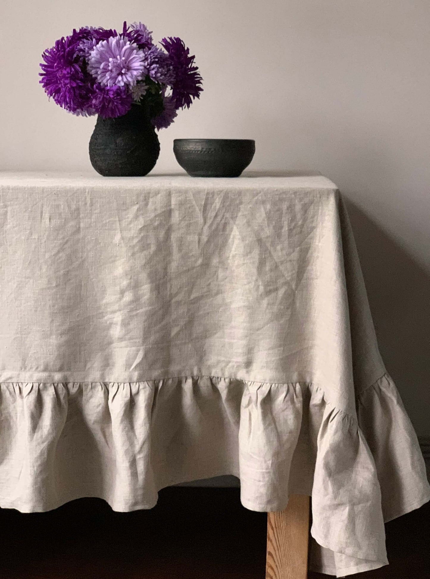Handcrafted natural linen tablecloth in a dining setting