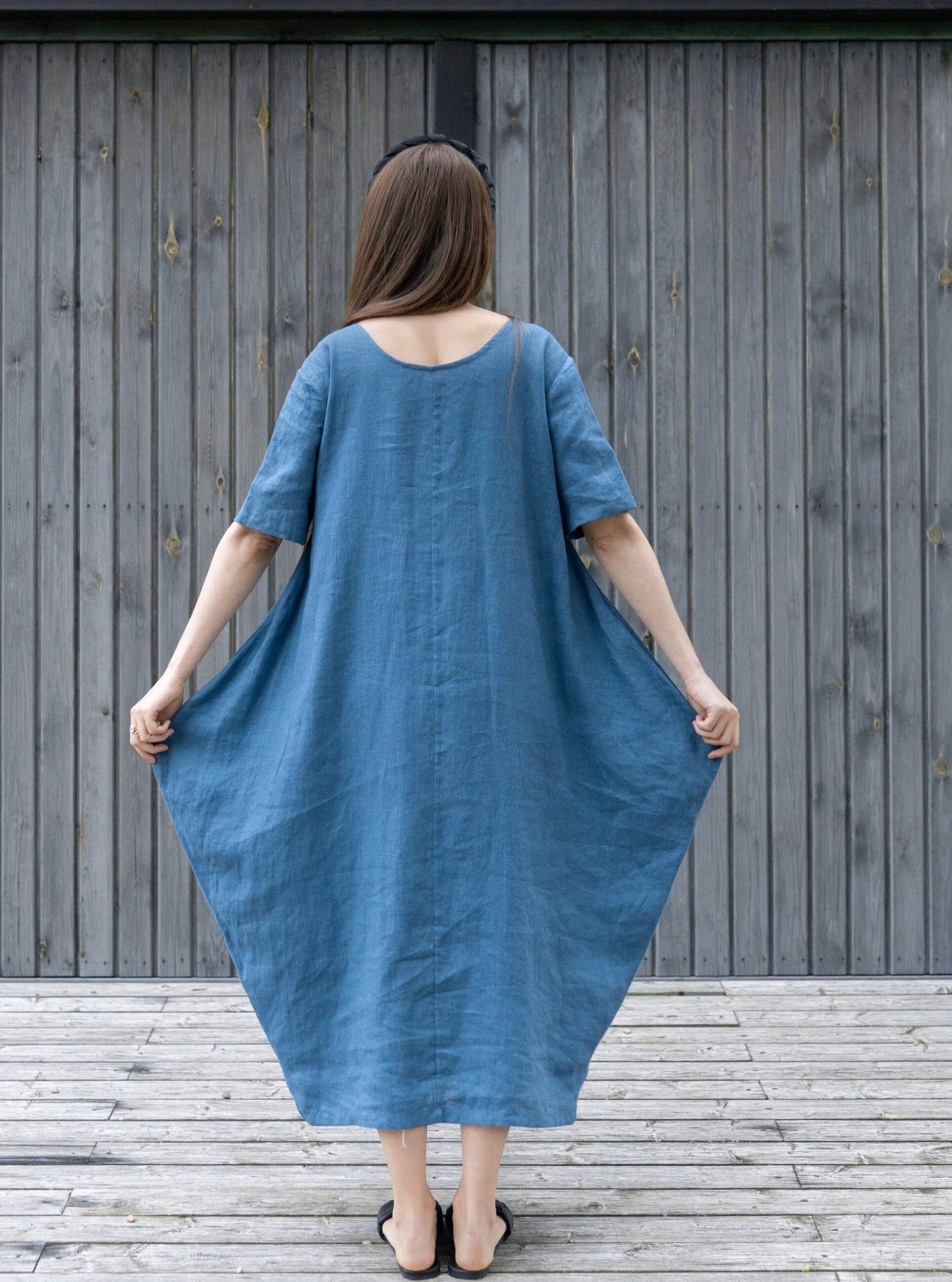 Close-up of stylish pocket detail on linen dress
