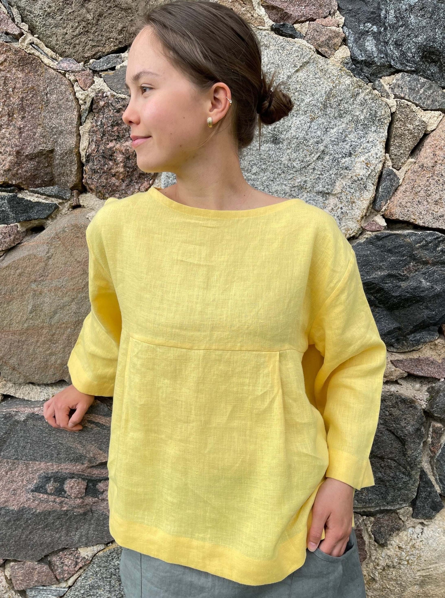 Elegant sun yellow linen tunic for stylish women.