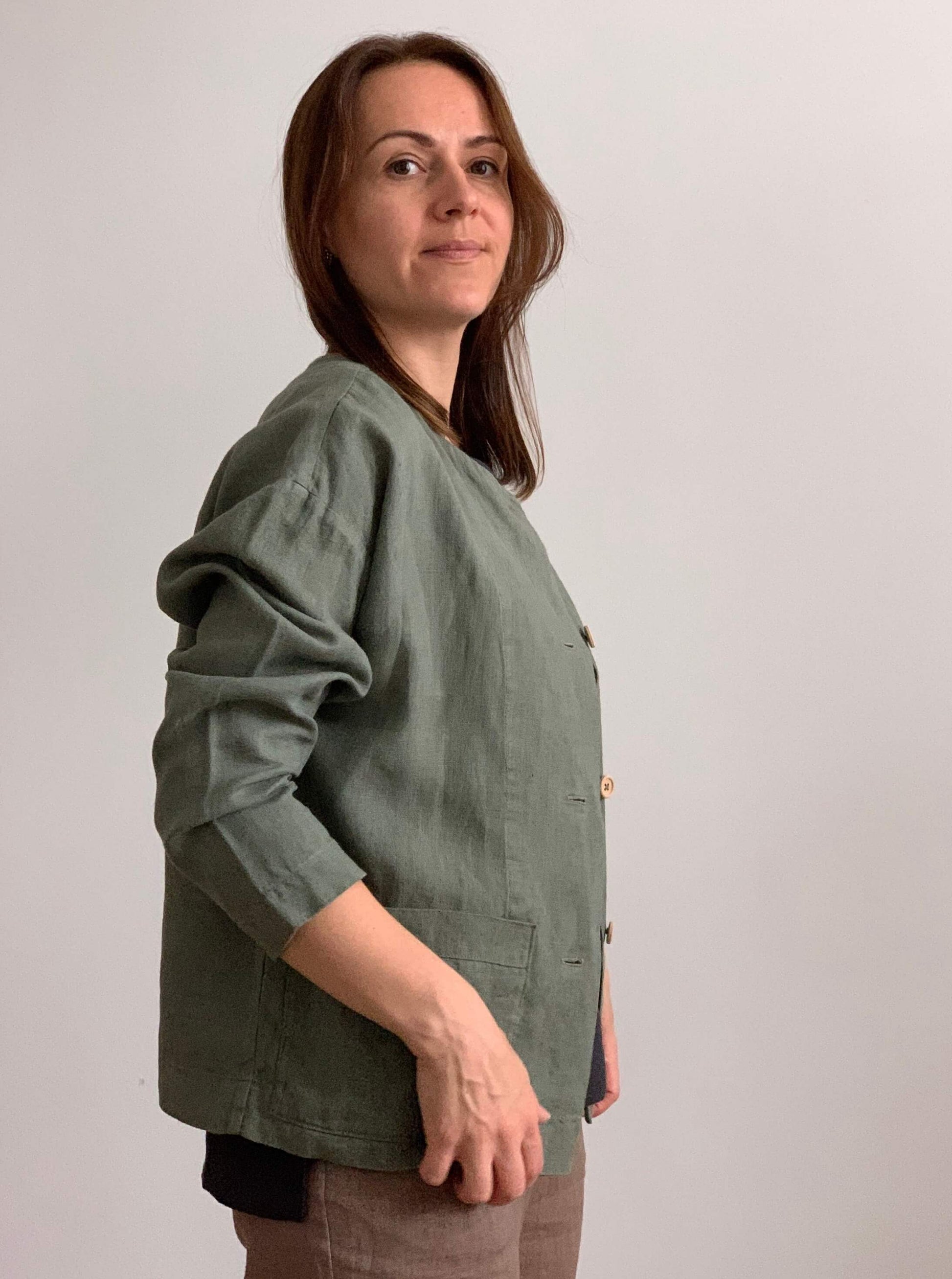 Oversized linen jacket showcasing pocket details.