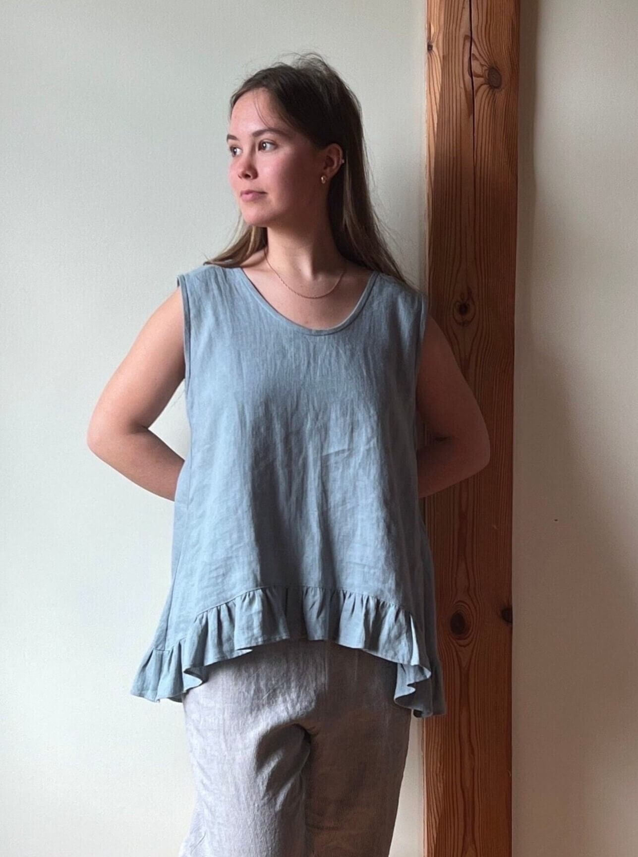 Handcrafted women’s linen top with delicate frills