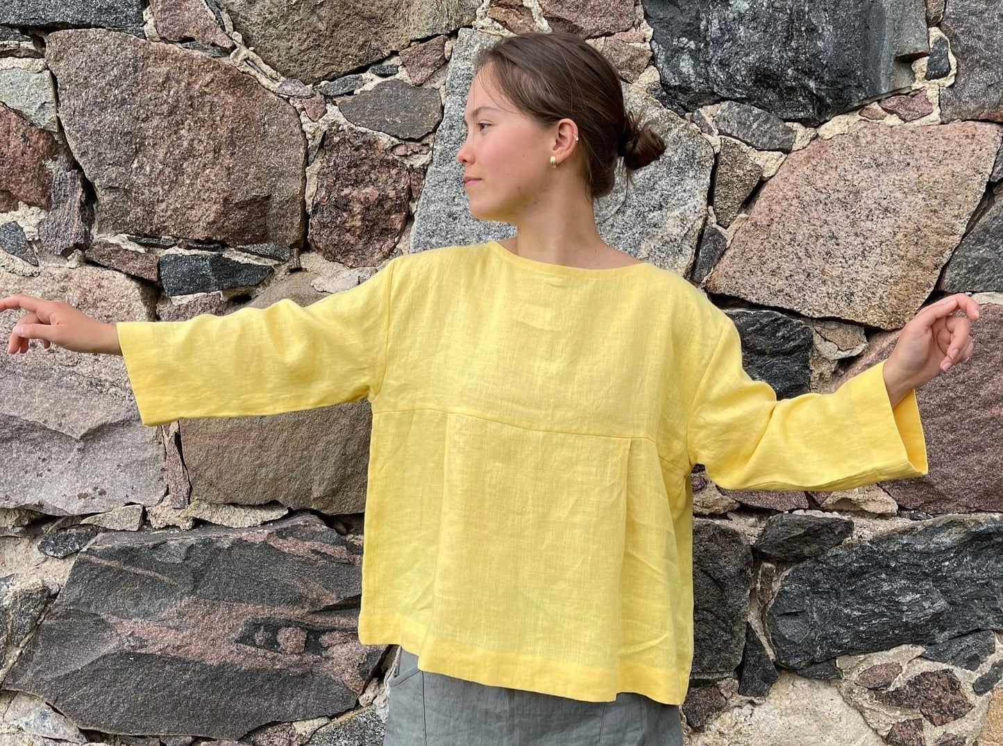Vibrant handmade linen blouse in high-quality material.