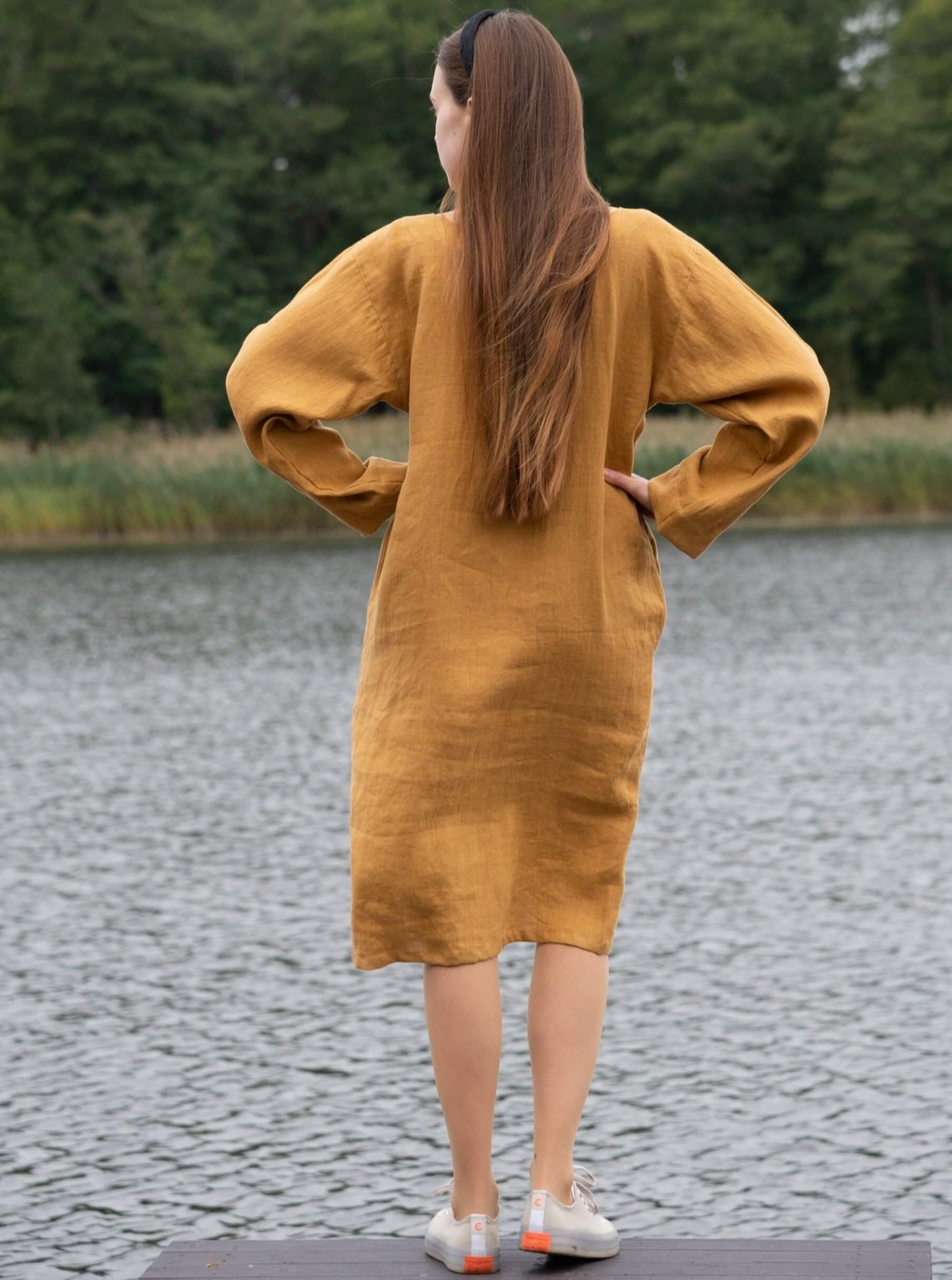 Detail of comfortable linen fabric in tunic dress