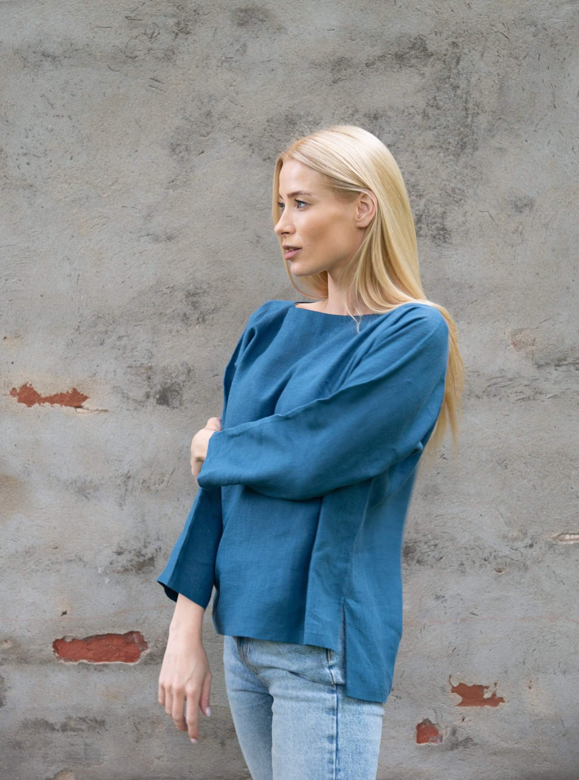 Back view of elegant linen top with longer back