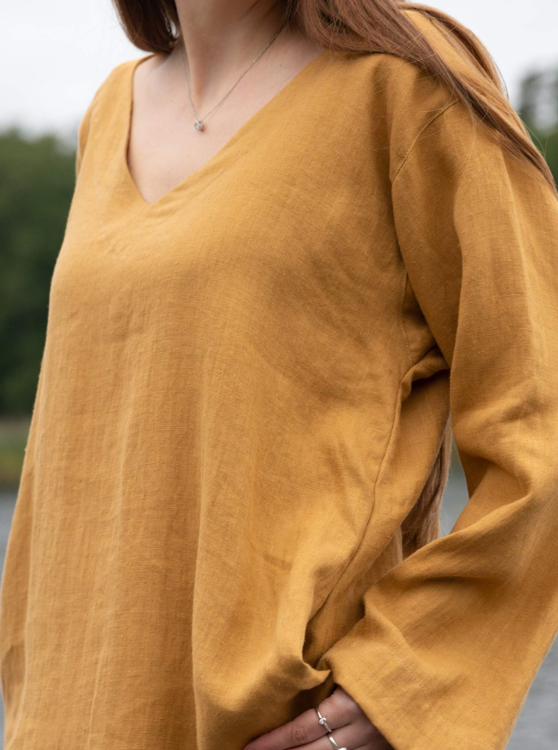 Back view of stylish V-neck tunic dress