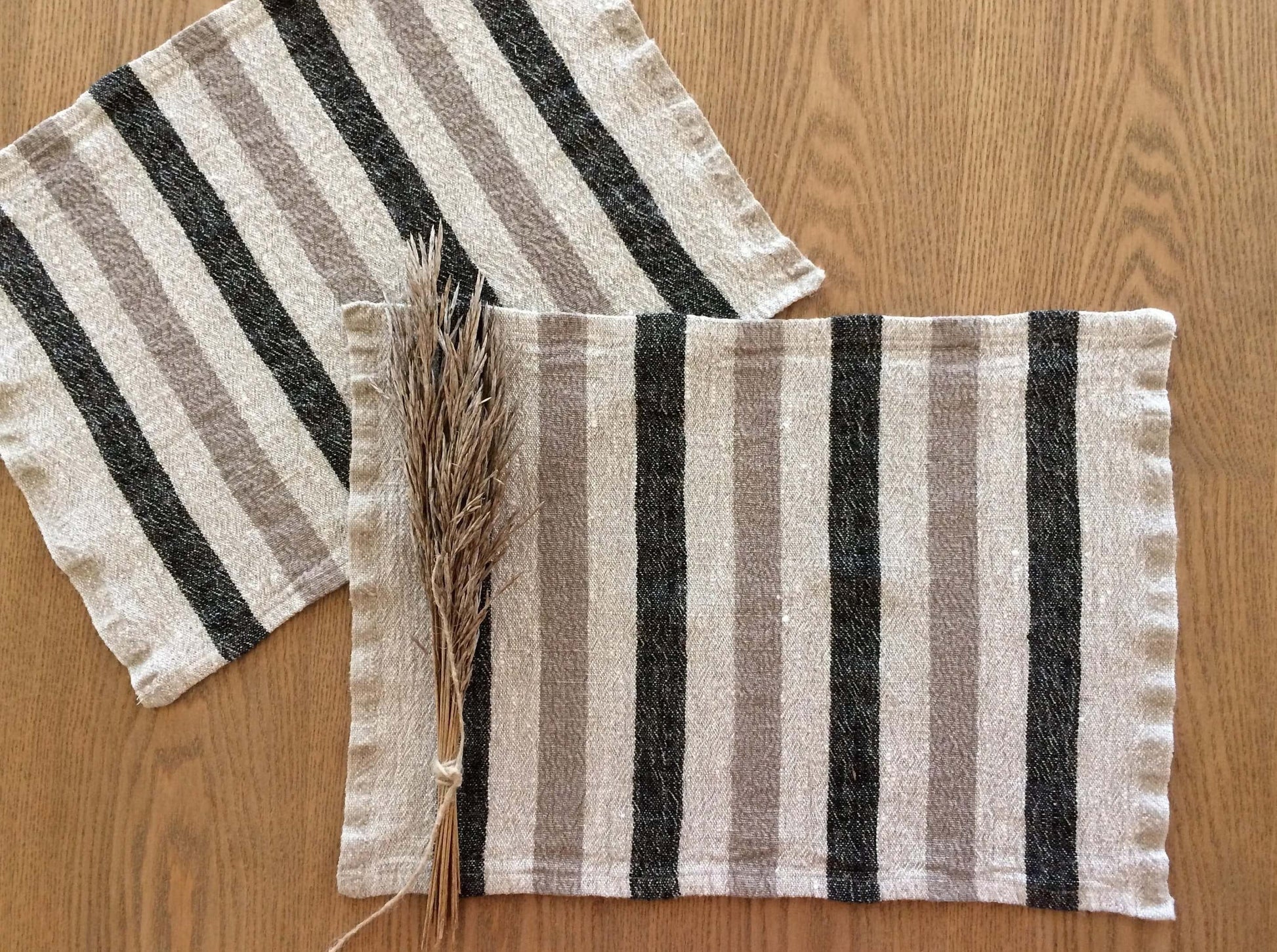 Black and grey stripe linen placemat set on dining table