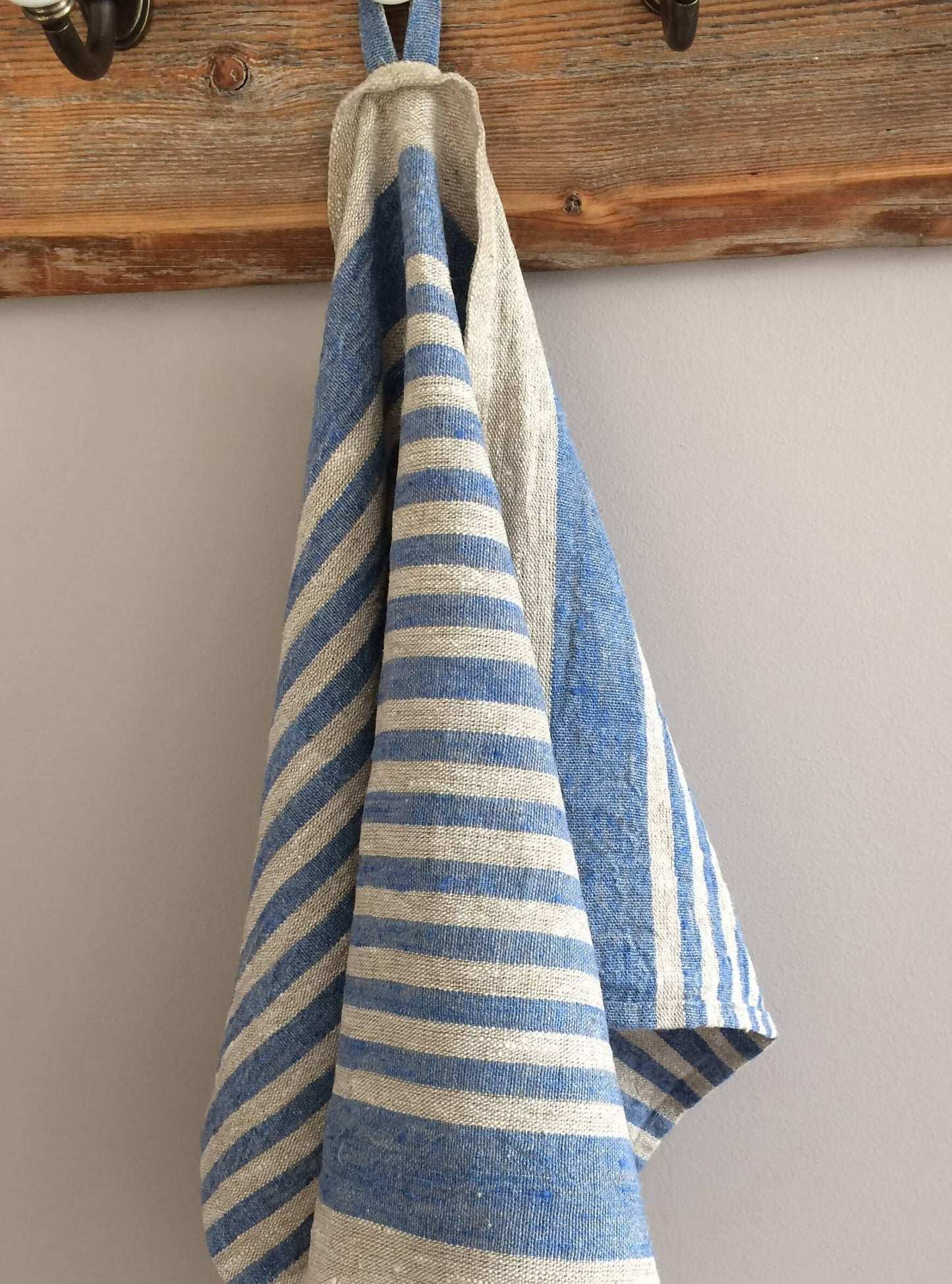 Handcrafted linen towel with sky blue and beige stripes