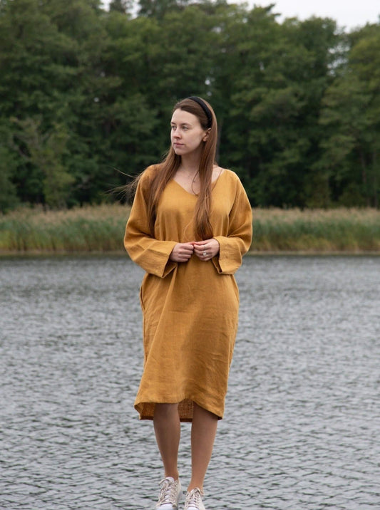 Front view of stylish V-neck linen tunic dress