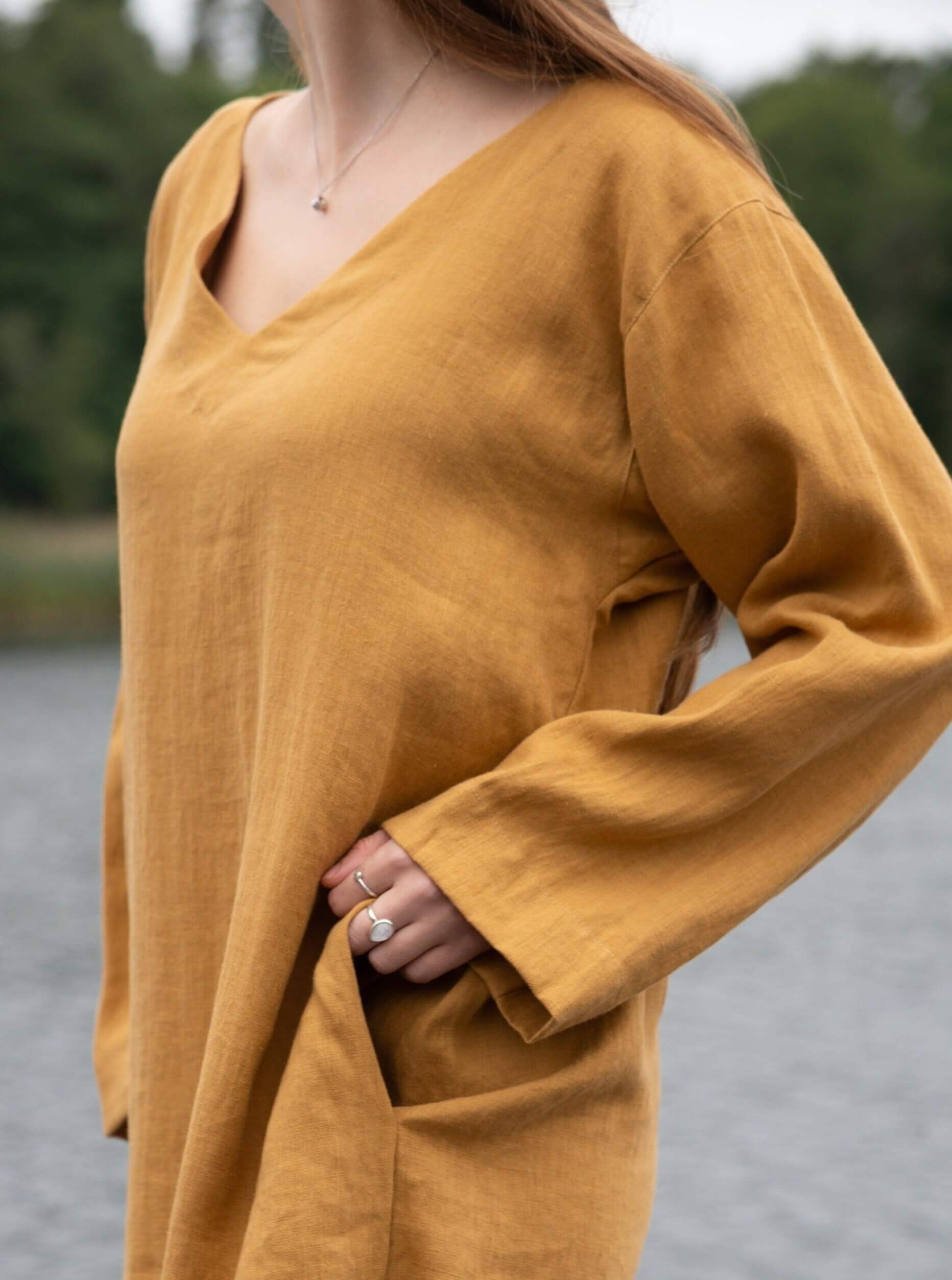 Full-length image of linen tunic dress, perfect for summer exploration.